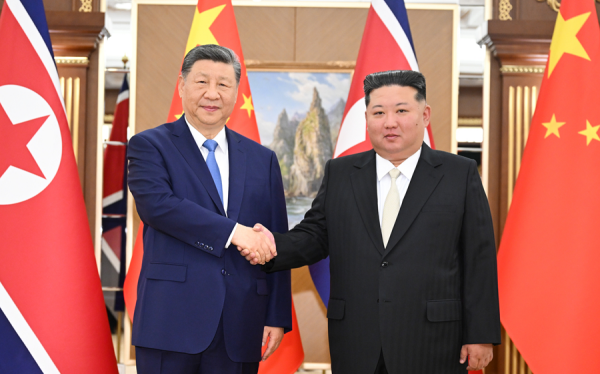 习近平同金正恩举行会谈