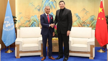 罗照辉署长会见联合国发展系统驻华协调员常启德